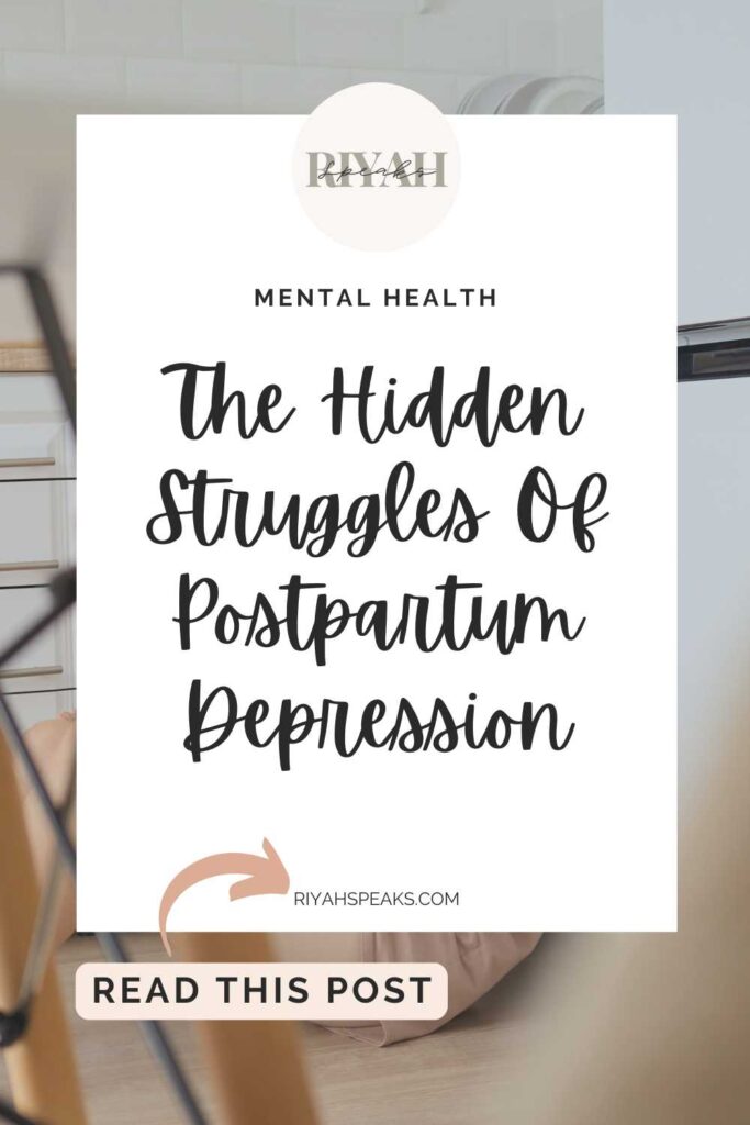 View from under the table exhausted mother sitting on the kitchen floor holding her infant feeling overwhelmed and frustrated by the difficulties of postpartum depression and parenthood with a white square box and black cursive bold letters that say The Hidden Struggles Of Postpartum Depression